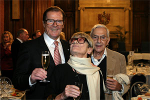 Sir Roger Moore with Sir Kenneth & Lady Adam